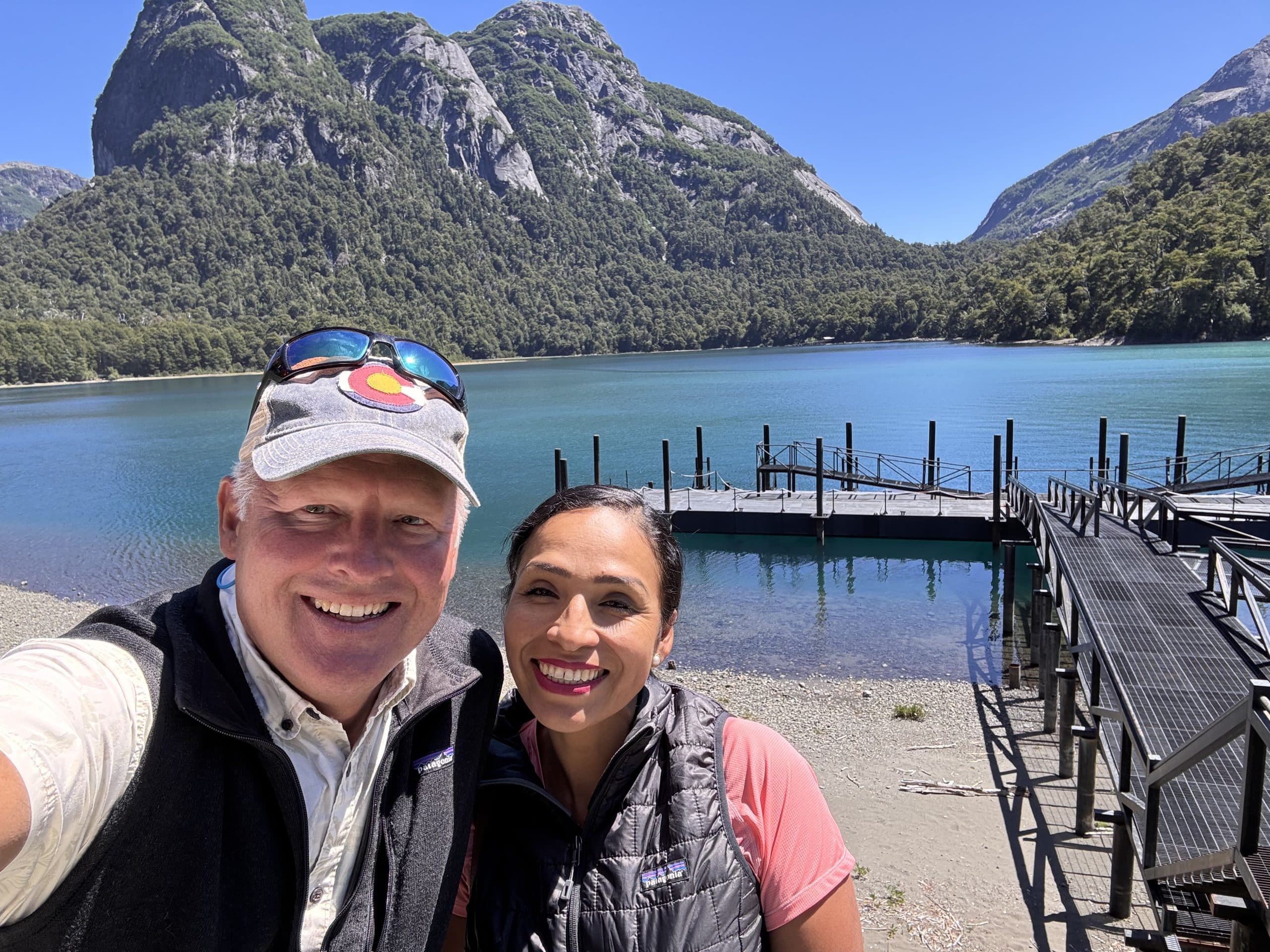 Gisella and John at a turquoise lake near Bariloche, Argentina